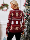 Back view of a woman wearing a burgundy knit sweater with gingerbread man and Christmas tree pattern.