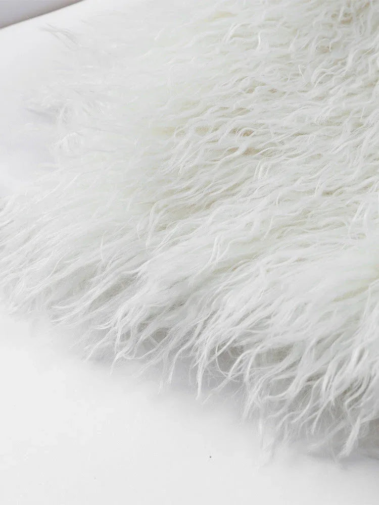 Close-up of cream shaggy faux fur texture detail