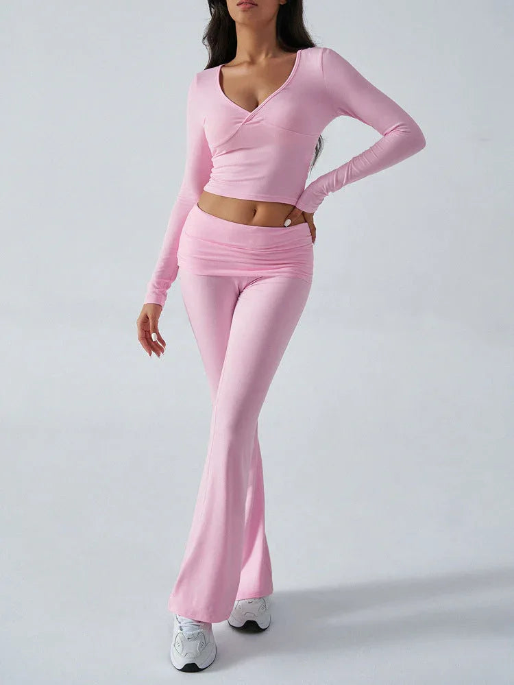 Pink long sleeve crop top with flared pants set