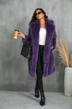 Woman in a purple faux fur coat holding a coffee cup and handbag.