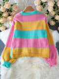 Back of a multi-colored striped knit cardigan
