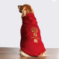 Side view of a Golden Retriever dog wearing a red hooded sweatshirt with gold Chinese characters on the back.