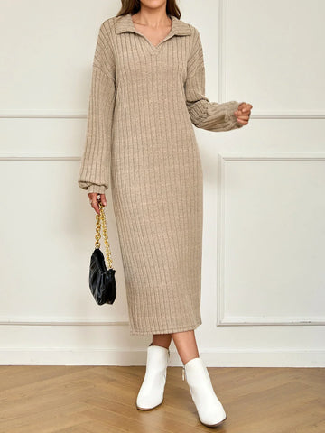 Woman wearing a beige ribbed knit maxi dress with a polo collar