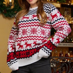 Close-up of a red and white Christmas sweater with a festive pattern