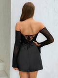Back view of a woman in a black off-the-shoulder dress with lace-up detail