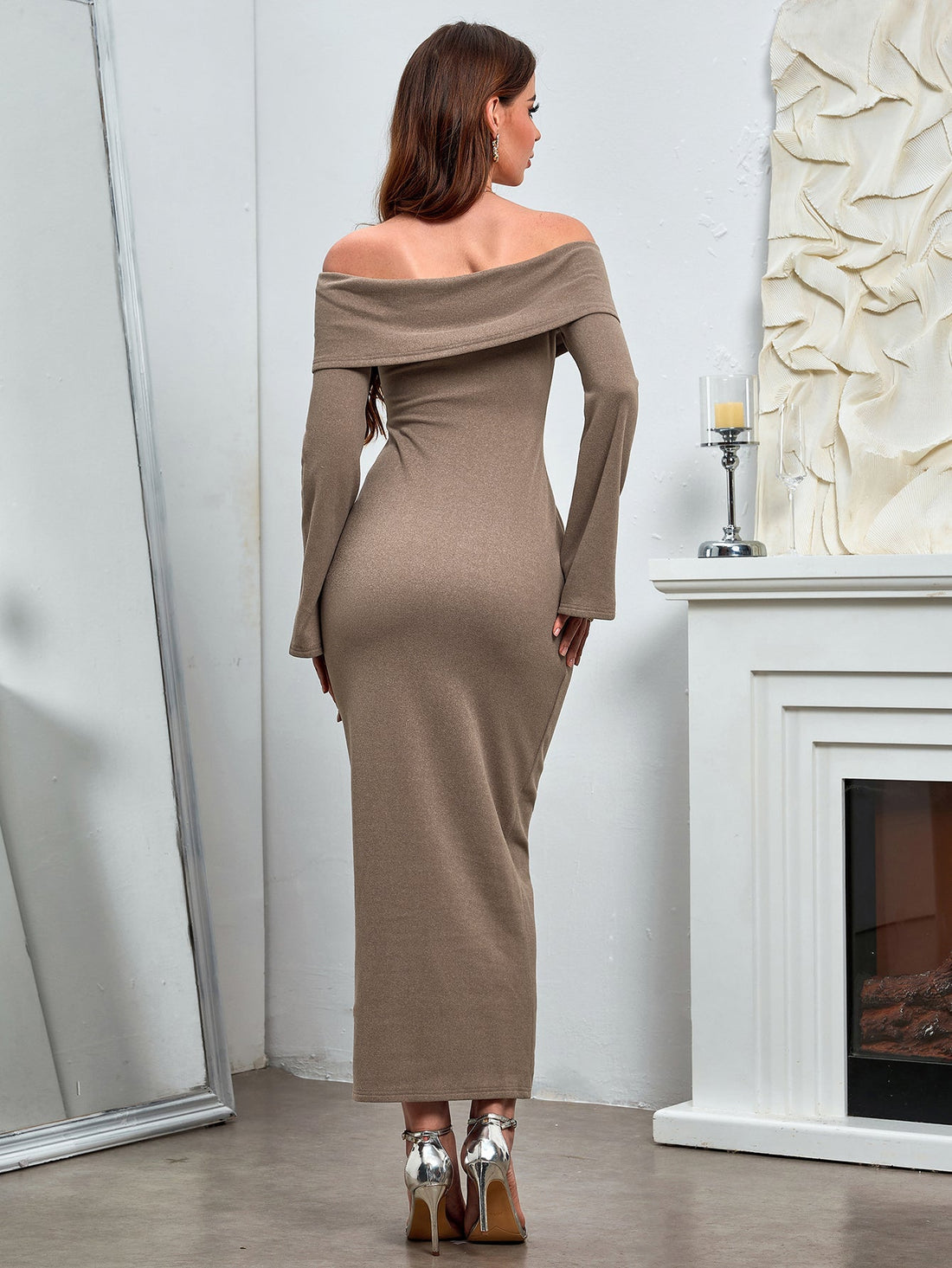 woman wearing a taupe off-the-shoulder knit dress with long bell sleeves and a fold-over collar detail