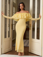 Full length view of a woman in an elegant yellow gown