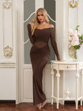 Woman wearing a long brown off-the-shoulder ruched dress with sheer sleeves and bodice