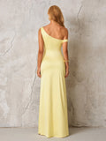 Back view of a woman in a pale yellow satin one-shoulder floor-length gown