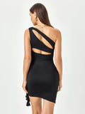 Back view of a woman in a black one-shoulder bodycon dress with cut-out details