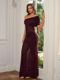 Full length view of a woman in a burgundy one-shoulder ruched gown