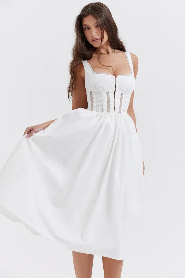 Model wearing a white sleeveless A-line dress with a square neckline and corset-style bodice. Main image