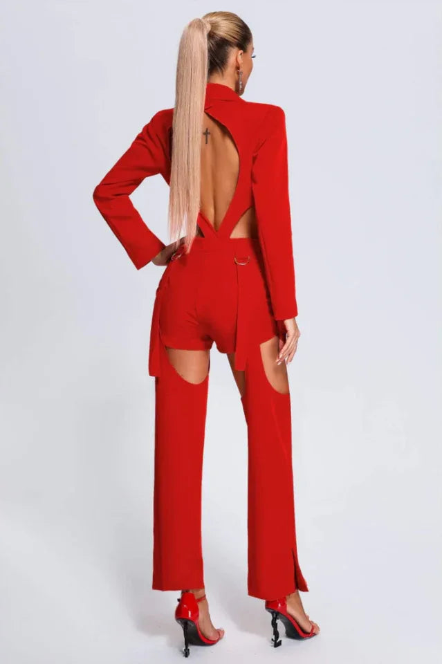 Back view of a red jumpsuit with open back and thigh cut-outs