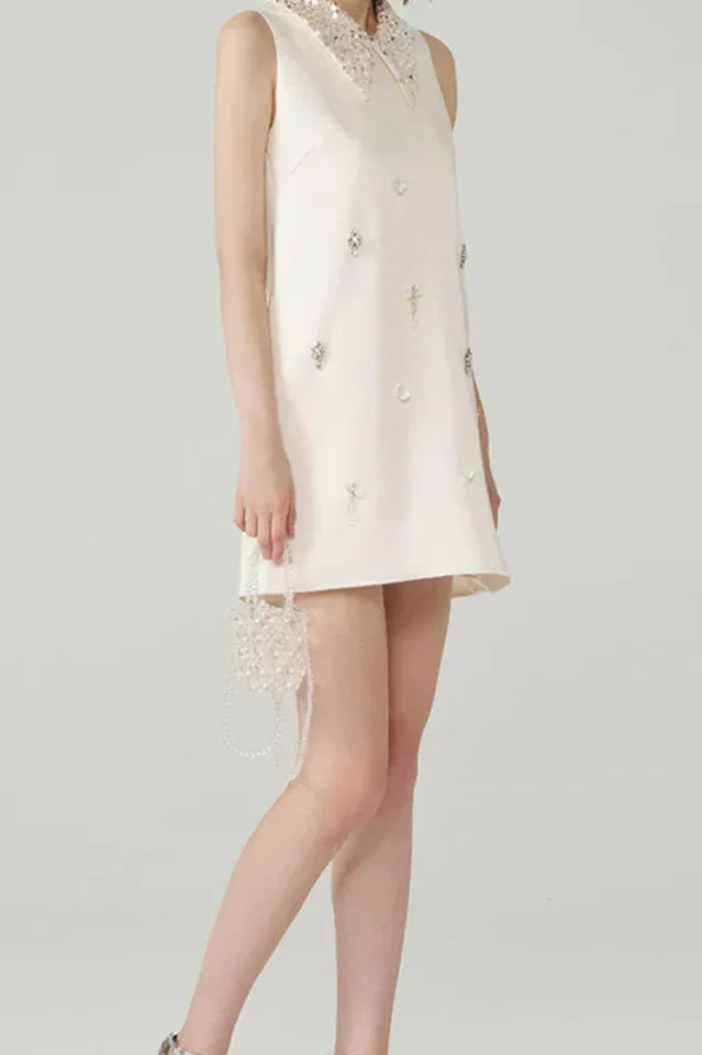Detail of embellishments on Elif Sleeveless Embellished Mini Dress
