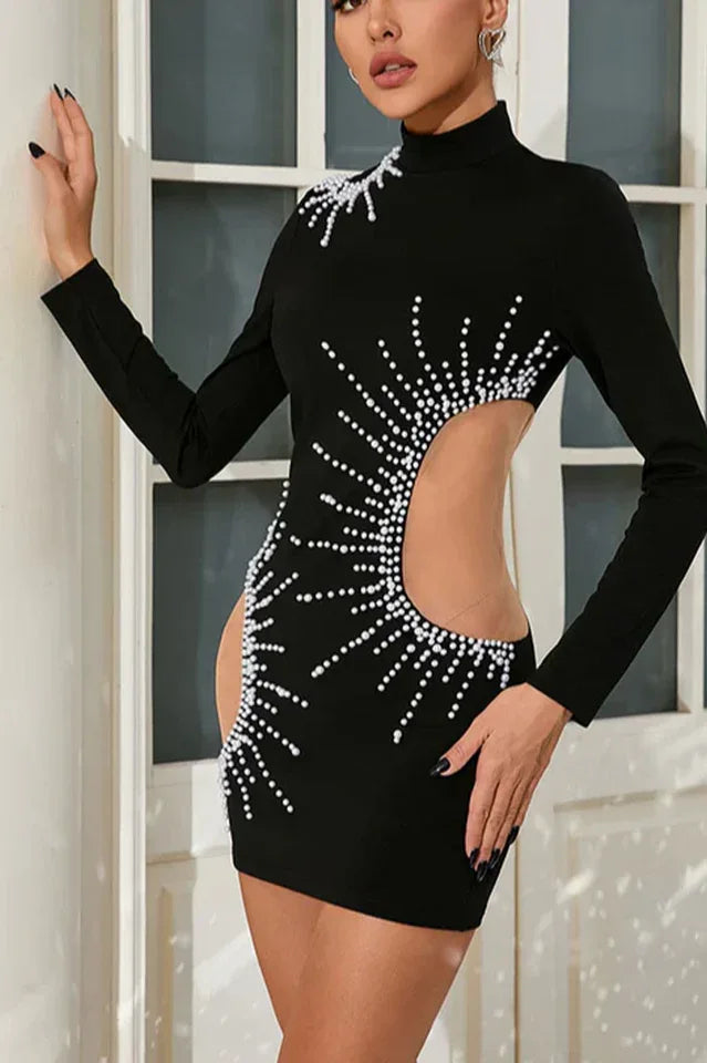 Back view of a black bodycon mini dress with cut-out sides and pearl embellishments