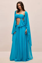 Elegant blue maxi dress with a strapless bodice and draped details