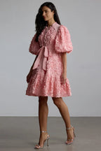 Close-up of the 3D floral detailing on a dress