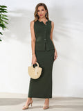 Woman wearing a dark green ribbed knit sleeveless collared button-up top and a matching high-waisted column maxi skirt, holding a straw handbag.