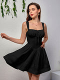 pleated hem ruched bust tie front cami dress#color_black