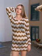 Woman posing with her hand on her head, wearing a chevron knit cover-up dress