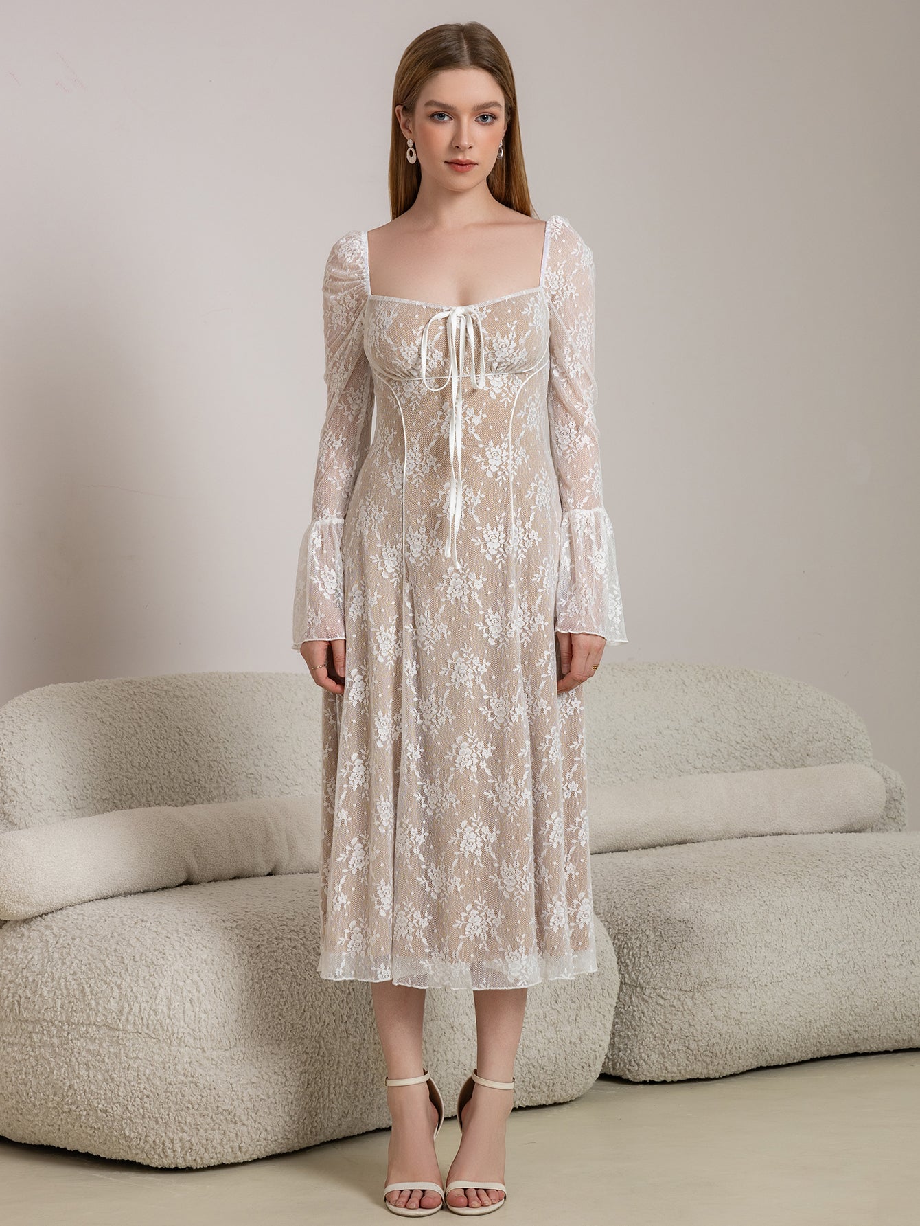 Fashionable white lace midi dress with elegant bell sleeves and a square neckline.