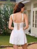 Back view of a white satin dress featuring a lace-up corset closure and adjustable straps.