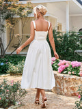 back view of a woman in a white sleeveless midi dress with a smocked back panel and full skirt