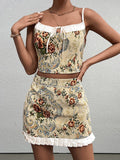 Close-up of woman wearing a yellow floral brocade cropped camisole with tie front detail.