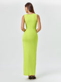 Back view of a woman in a sleeveless lime green maxi dress.