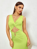 Close-up of the V-neck, twist front, and cut-out detail on a lime green maxi dress.