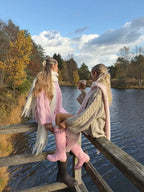 Woman wearing a pink chunky cable knit sweater - View 11 | WEUXS