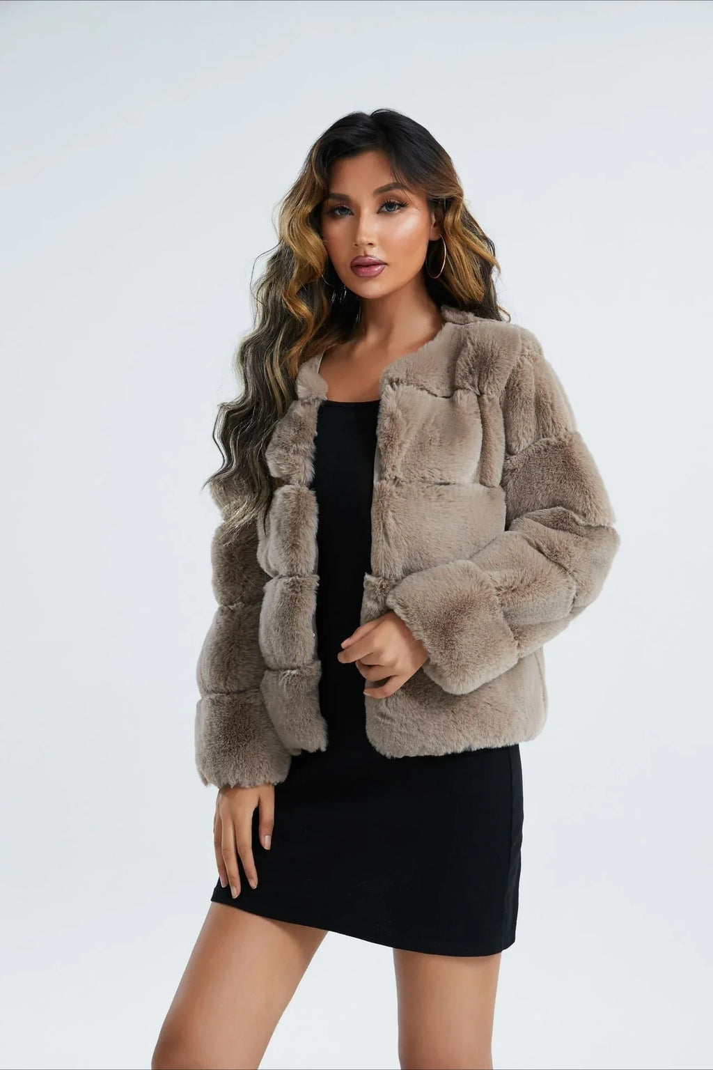 Model styled in a cropped faux fur jacket