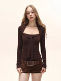 Close-up of the square neckline and tie detail on a long sleeve top