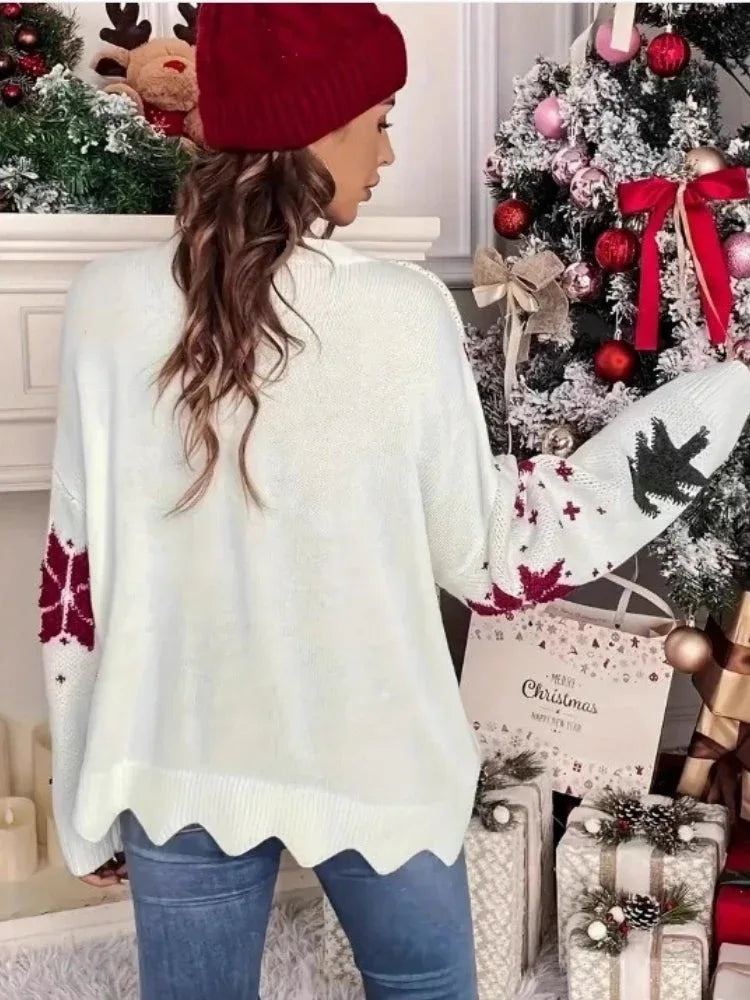 Back view of a relaxed fit holiday sweater with a scalloped hem.