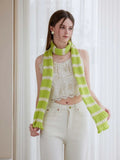 Woman wearing a long black and white striped knit scarf with ruffle edges - View 10 | WEUXS