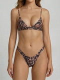 Close-up of the snake print bikini top with adjustable straps.