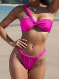 Fuchsia one-shoulder bikini with twisted front and ruched low-rise bottoms