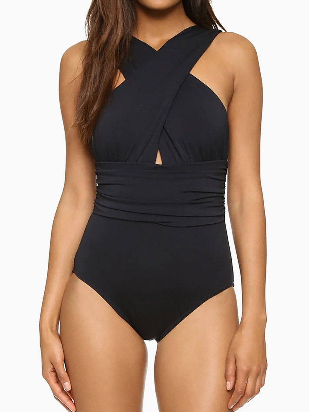 Woman wearing a black one-piece swimsuit with a criss-cross halter neckline and ruched waist detail