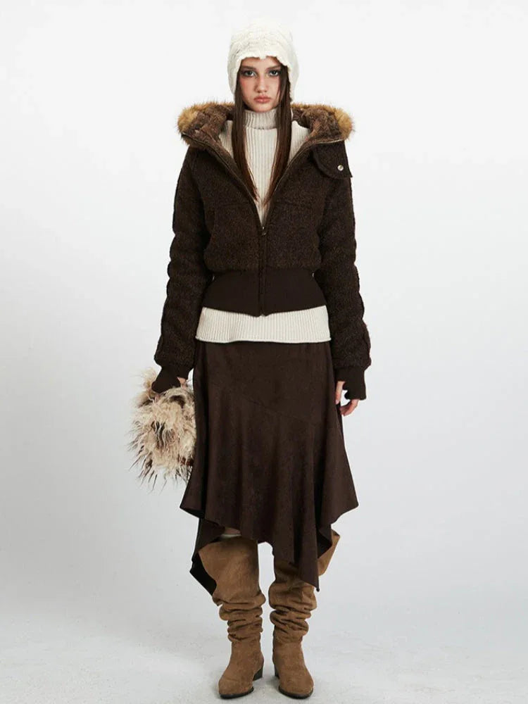 Model wearing a brown textured bomber jacket with a faux fur trimmed hood and white turtleneck
