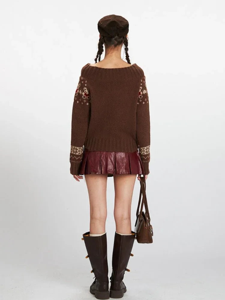 Woman wearing a brown Fair Isle knit sweater with a bear and bow pattern, paired with a red skirt and brown boots.