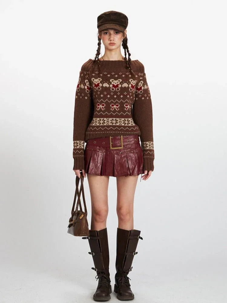Woman wearing a brown Fair Isle knit sweater with a bear and bow pattern, paired with a red skirt and brown boots.