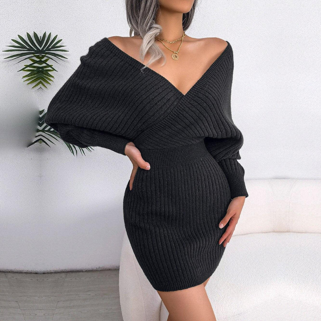 Close-up of the charcoal grey knit wrap dress on a model