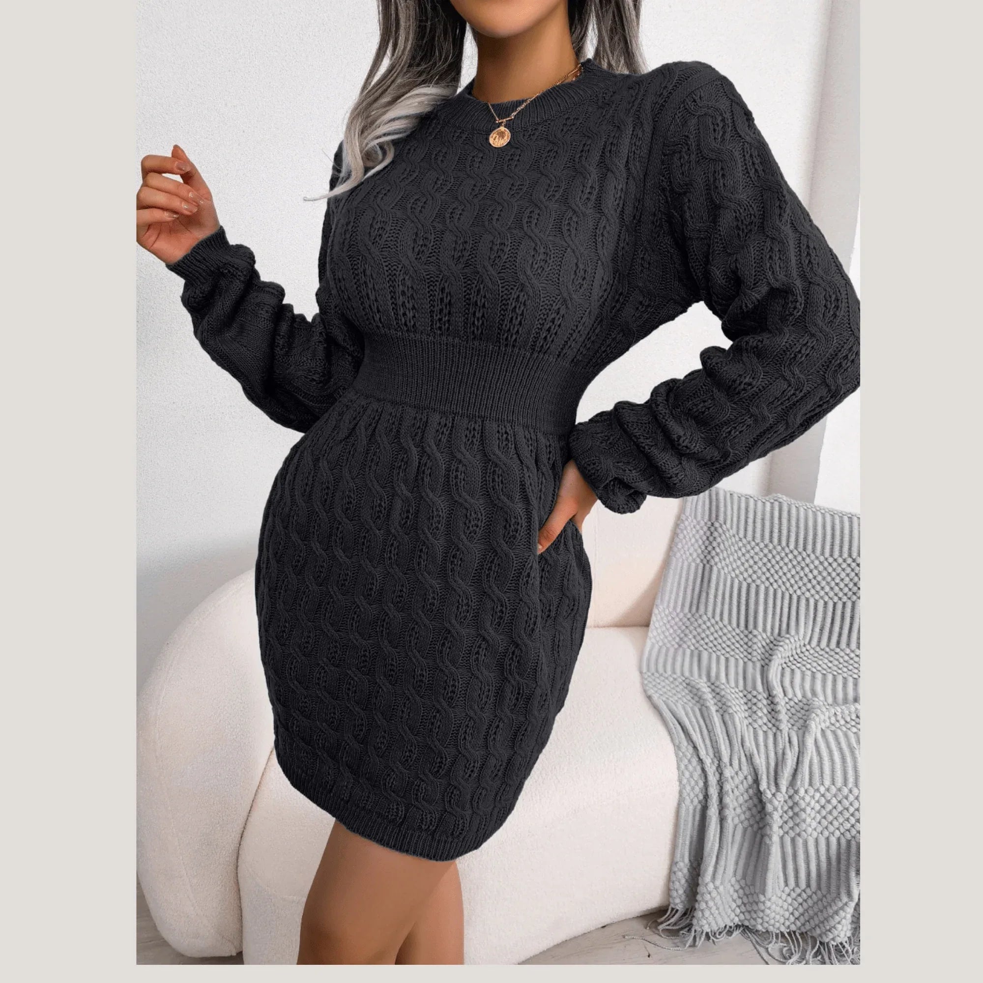 Front view of a woman in a blue bodycon knit dress with cable knit pattern