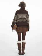 Back view of a woman in a brown Fair Isle knit cardigan.