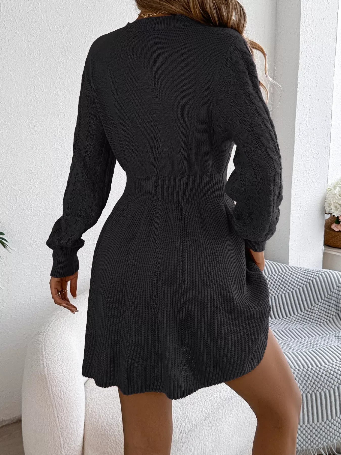 detail of cable knit texture on sweater dress