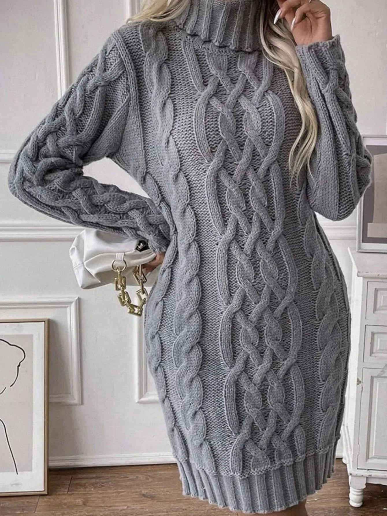 Close-up of the cable knit texture on a grey sweater dress