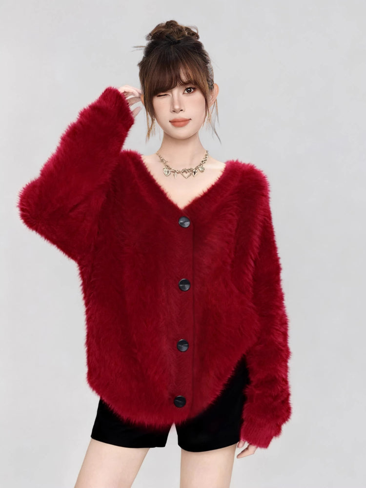 Red fuzzy V-neck cardigan with black buttons