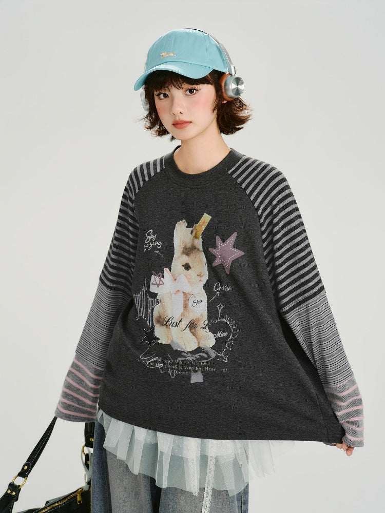 Front view of the woman posing, showing the overall style of the graphic t-shirt.