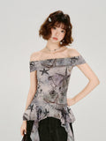 Front view of the off-the-shoulder top with a ruffled peplum