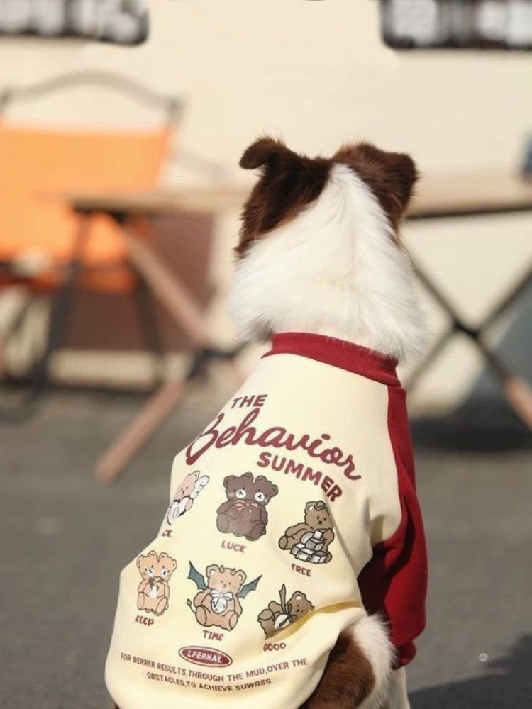 Back view of a dog wearing a large breed dog fleece pullover with graphic.